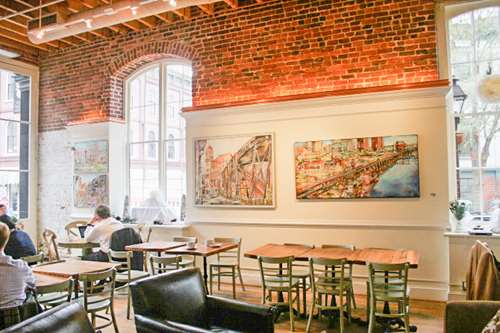 Paintings on the walls of the interior on the cafe.